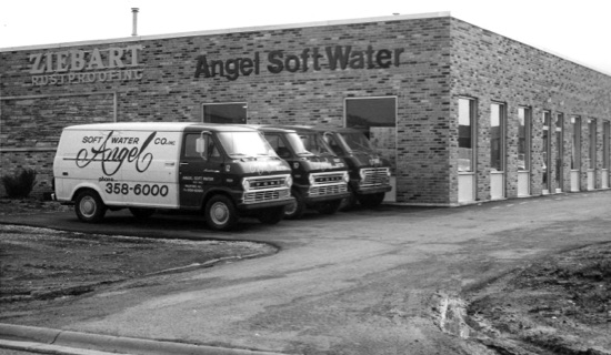Angel Water building with company vans