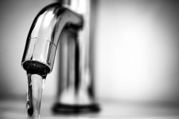 A kitchen sink producing clean tap water