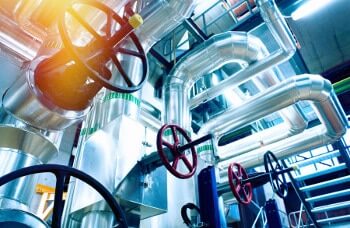 Photo of valves and equipment in a water treatment facility.