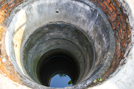 Photo of a deep well.