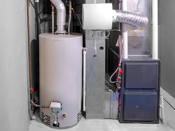Water heater next to other home appliances.