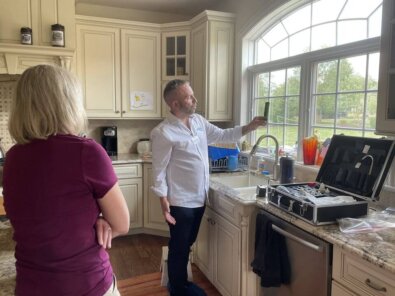 andrew-testing-water-quality-in-home