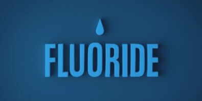 Image with a water sign above the word fluoride