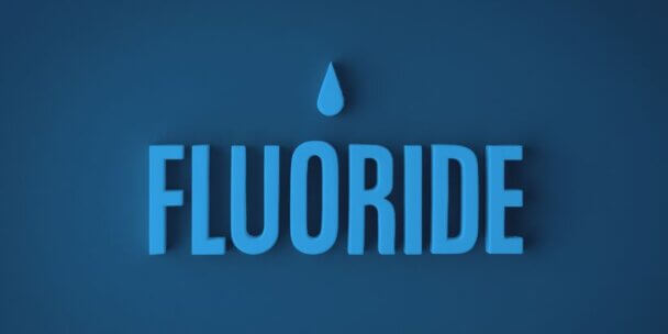 Image with a water sign above the word fluoride