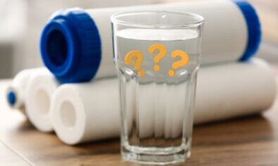 Filter and glass of water for blog answering question how often to change water filter