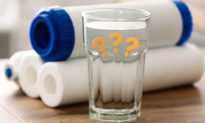 Filter and glass of water for blog answering question how often to change water filter